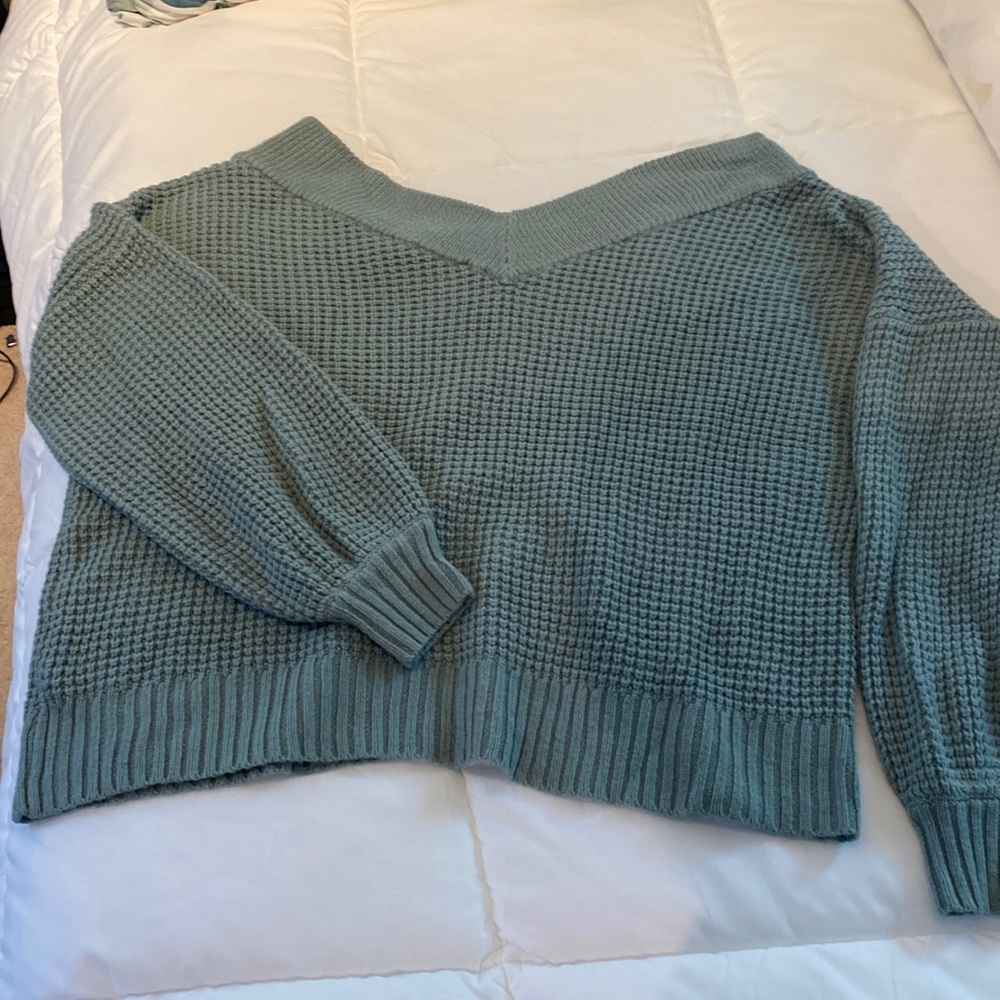 Beautiful oversized sweater with double VNeck.